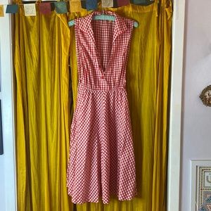 Handmade checkered dress. One button. Two pockets. Elastic waist.